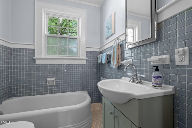 bathroom with backsplash, toilet, vanity, and tile walls