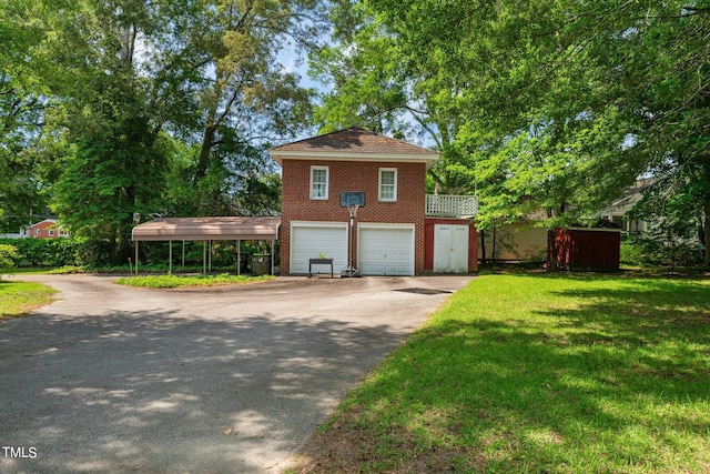 view of front of house featuring a front yard and a carport