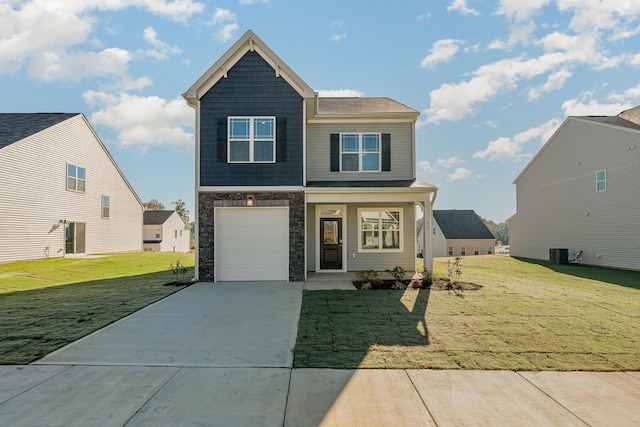 view of front facade with a front yard, a garage, covered porch, and central air condition unit