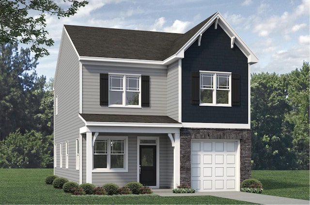 view of front of property featuring a front yard and a garage