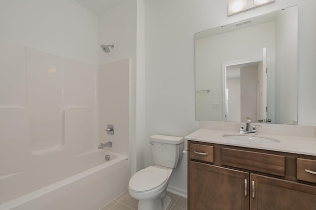 full bathroom with shower / tub combination, vanity, toilet, and tile patterned floors