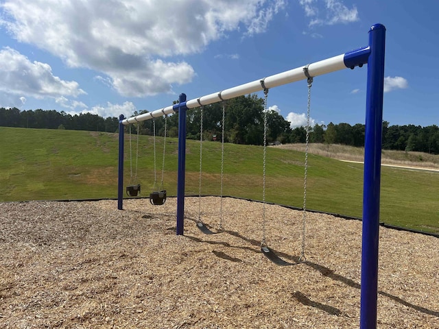 view of jungle gym featuring a yard