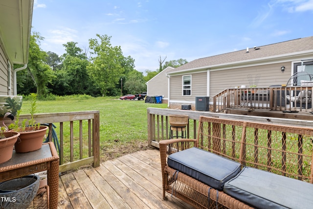 deck with central air condition unit and a yard