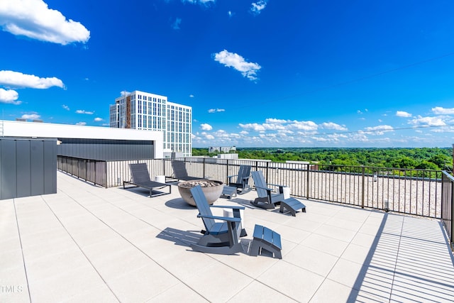 view of patio / terrace featuring a fire pit