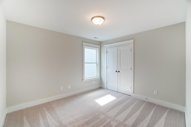 2023 Seneca Dr Lot 32, Raleigh, NC 27604 - empty room featuring light colored carpet