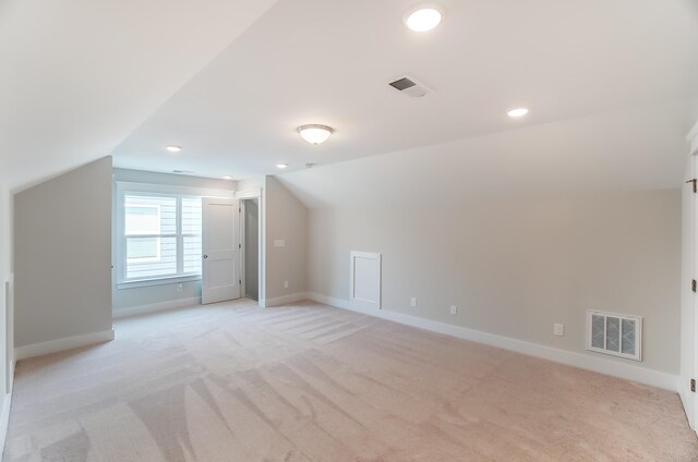 2023 Seneca Dr Lot 32, Raleigh, NC 27604 - additional living space with vaulted ceiling and light carpet