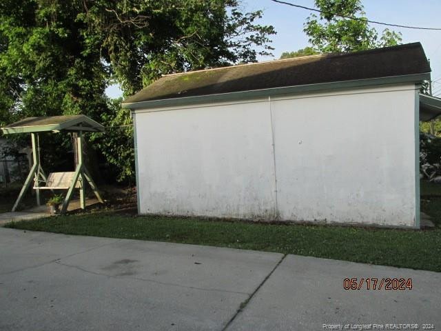 view of outdoor structure featuring a playground