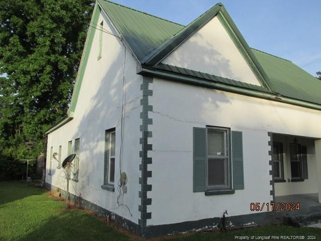 607 Carthage Rd, Lumberton, NC 28358 - view of property exterior with a yard