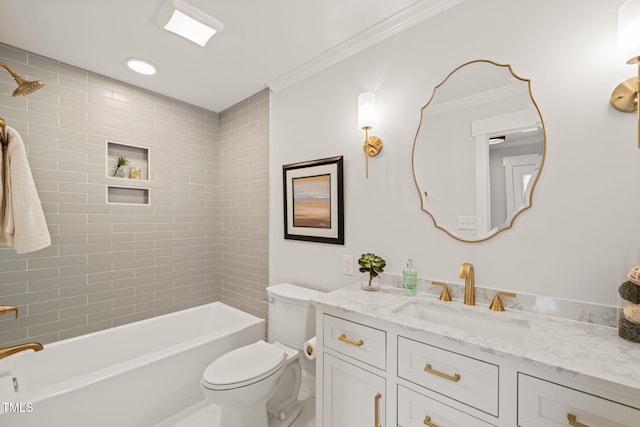 full bathroom featuring vanity, toilet, tiled shower / bath, and crown molding