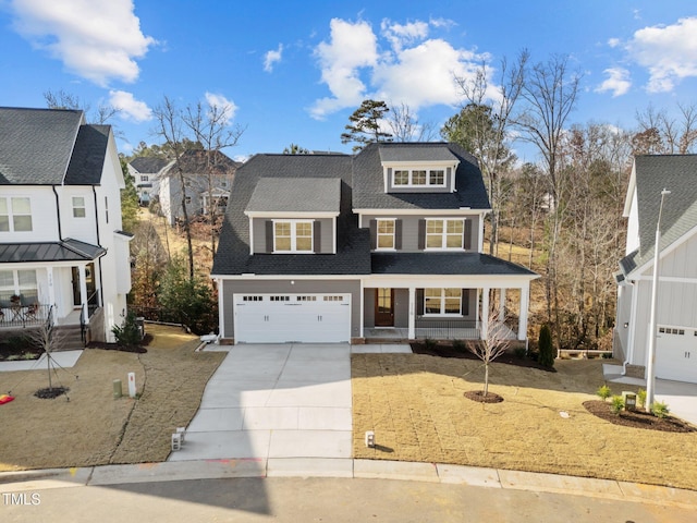 view of front of property with covered porch, a garage, and a front lawn