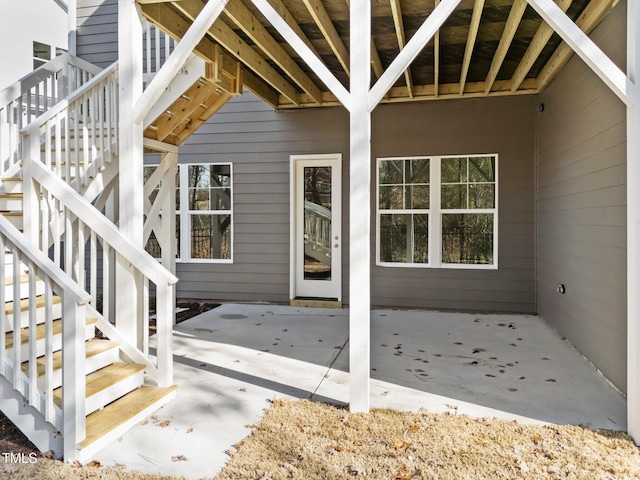 property entrance featuring a patio