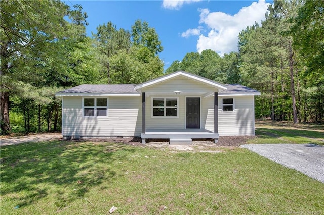 ranch-style home with a front yard