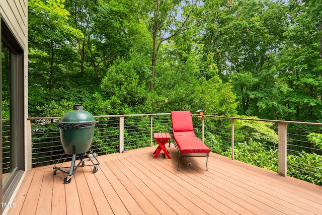 wooden terrace with grilling area