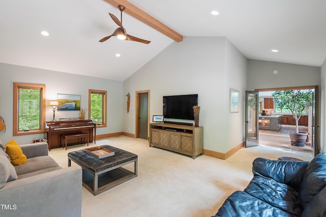 living room featuring high vaulted ceiling, plenty of natural light, light carpet, and beam ceiling