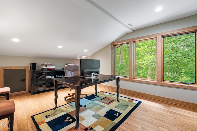 office area featuring lofted ceiling and light wood-type flooring