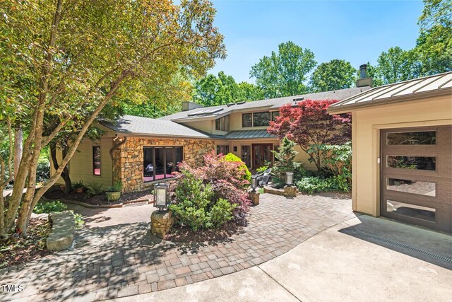 view of patio with a garage