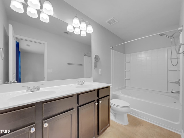 full bathroom featuring tile patterned flooring, vanity, toilet, and  shower combination