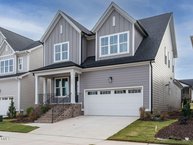 craftsman-style home with a garage, a porch, and central AC