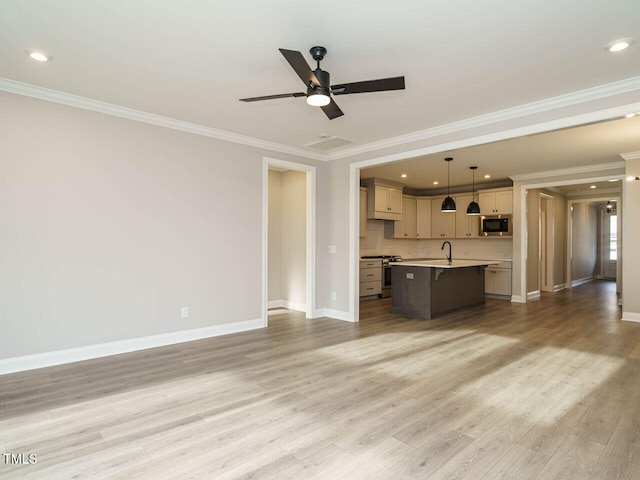 unfurnished living room with ceiling fan, light hardwood / wood-style floors, ornamental molding, and sink