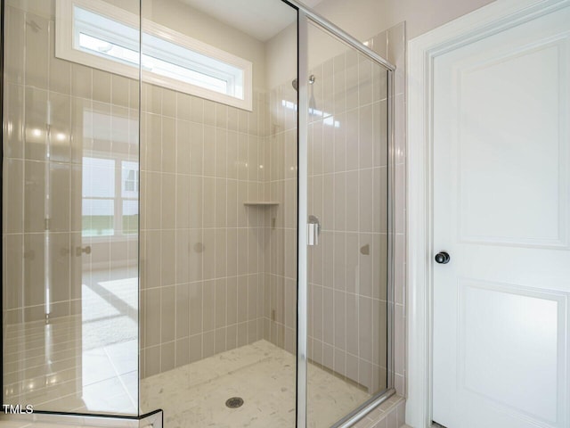 bathroom with walk in shower