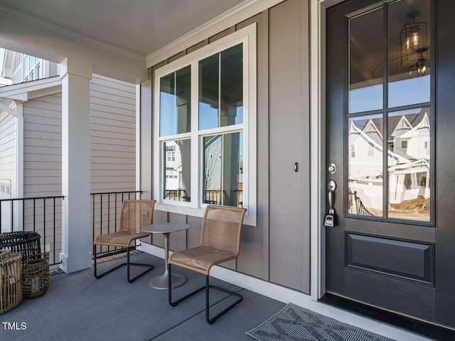 property entrance with covered porch