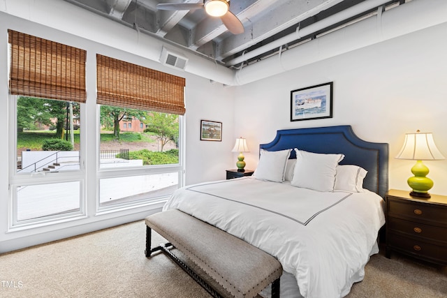 carpeted bedroom with ceiling fan