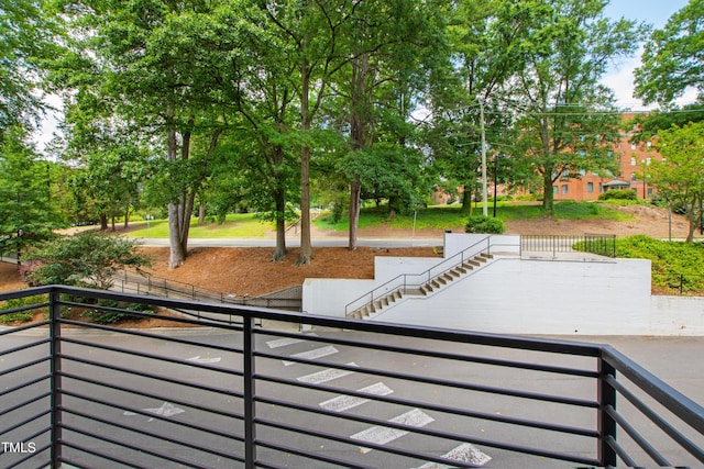 view of patio featuring a balcony