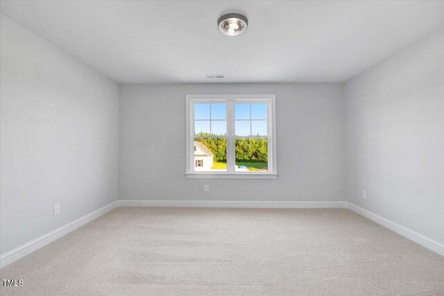 unfurnished room with carpet