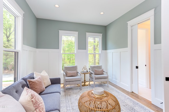 living room with light hardwood / wood-style flooring