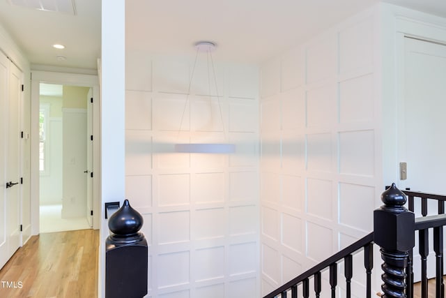 hallway featuring light hardwood / wood-style floors