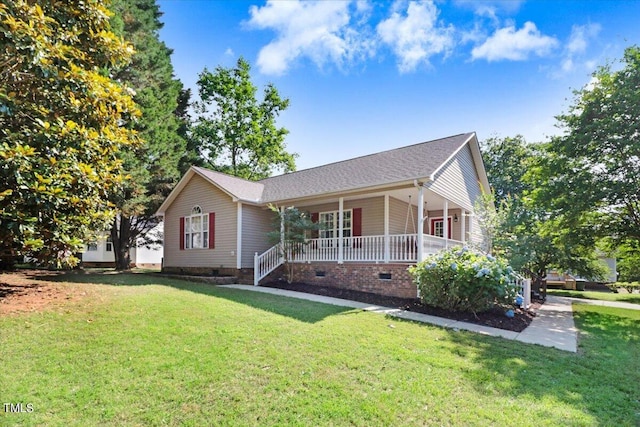 view of front of property with covered porch and a front yard