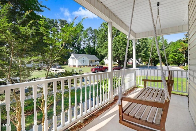 balcony featuring a porch