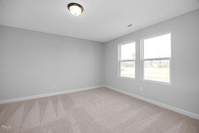 unfurnished room with carpet