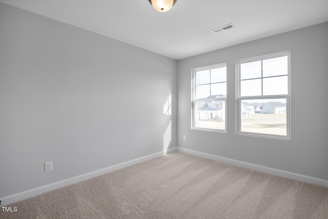 view of carpeted spare room