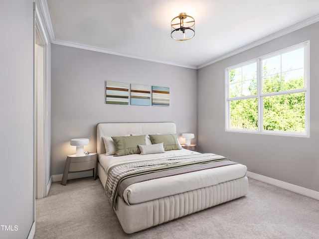 carpeted bedroom with ornamental molding