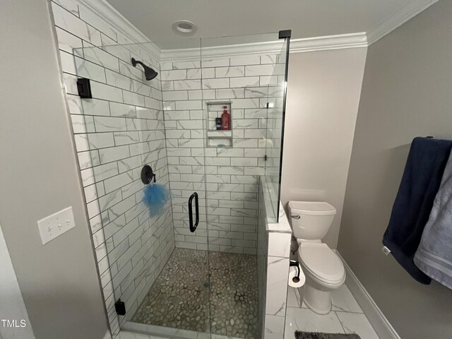 223 E Nash St, Spring Hope, NC 27882 - full bath with a shower stall, ornamental molding, toilet, marble finish floor, and baseboards