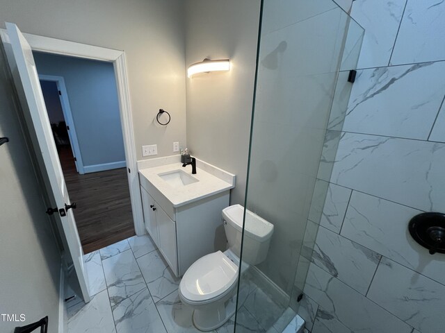 223 E Nash St, Spring Hope, NC 27882 - bathroom with toilet, a shower, marble finish floor, and vanity