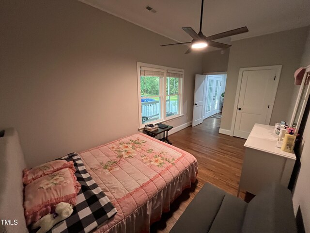 223 E Nash St, Spring Hope, NC 27882 - bedroom with ceiling fan, baseboards, dark wood-style floors, and visible vents
