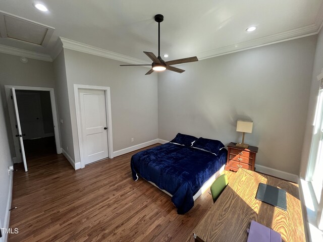 223 E Nash St, Spring Hope, NC 27882 - bedroom with crown molding, wood finished floors, and baseboards