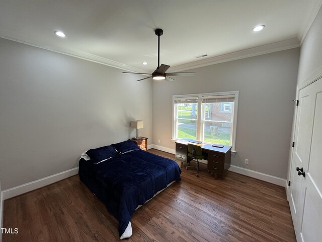 223 E Nash St, Spring Hope, NC 27882 - bedroom with visible vents, baseboards, ornamental molding, and wood finished floors