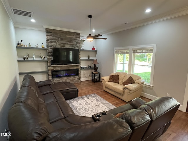 223 E Nash St, Spring Hope, NC 27882 - living area featuring a ceiling fan, wood finished floors, ornamental molding, and visible vents