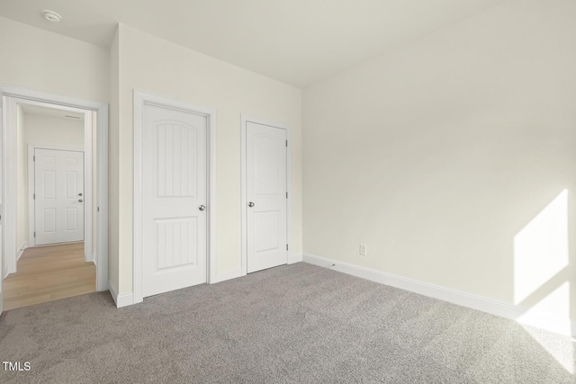 unfurnished bedroom featuring carpet floors