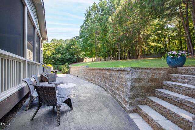 3209 Bryant Falls Ct, Raleigh, NC 27613 - view of patio with view of scattered trees