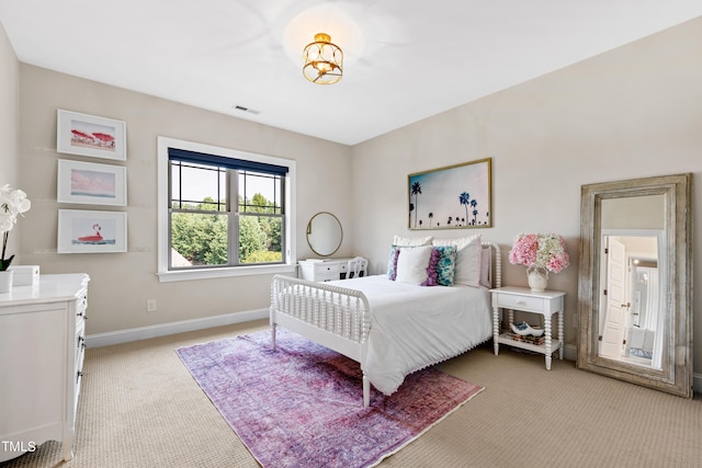 3209 Bryant Falls Ct, Raleigh, NC 27613 - bedroom with light carpet and baseboards