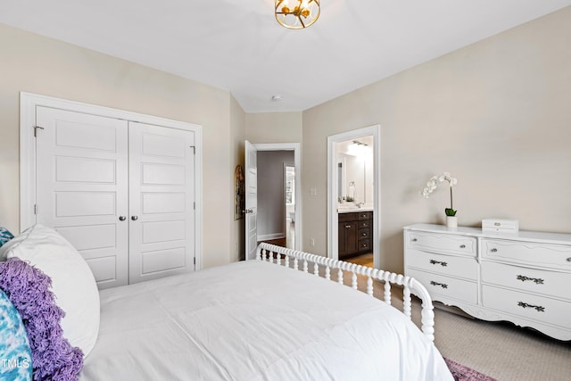 3209 Bryant Falls Ct, Raleigh, NC 27613 - bedroom featuring a closet and ensuite bath