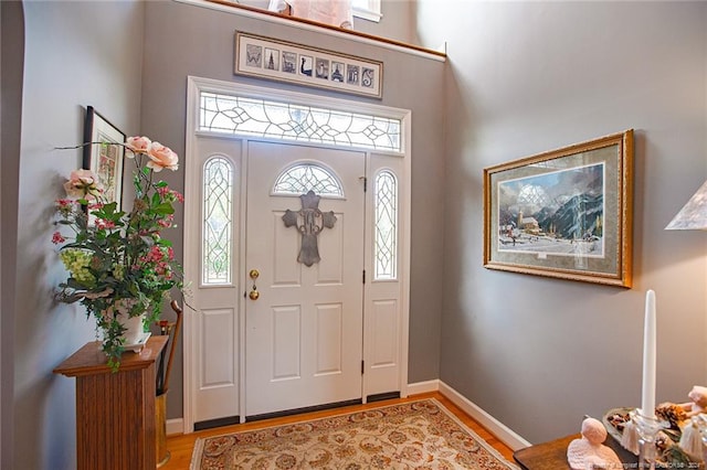 foyer with light wood-type flooring