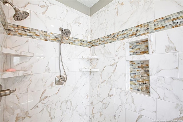 bathroom featuring tiled shower