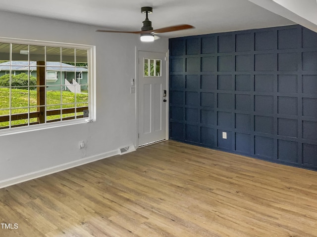 interior space featuring ceiling fan and light hardwood / wood-style flooring