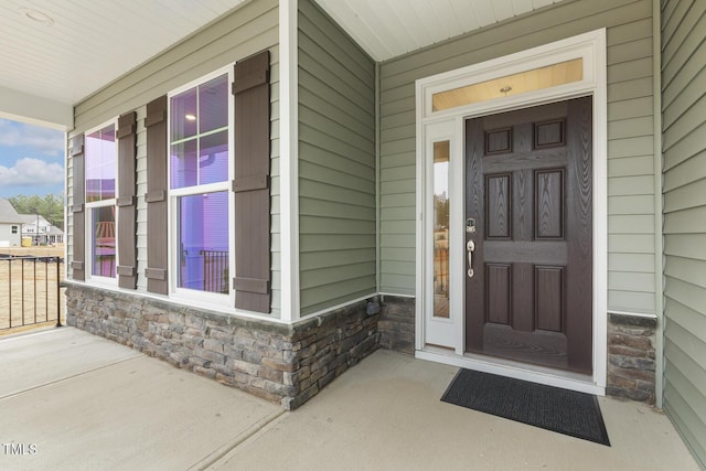 entrance to property with covered porch