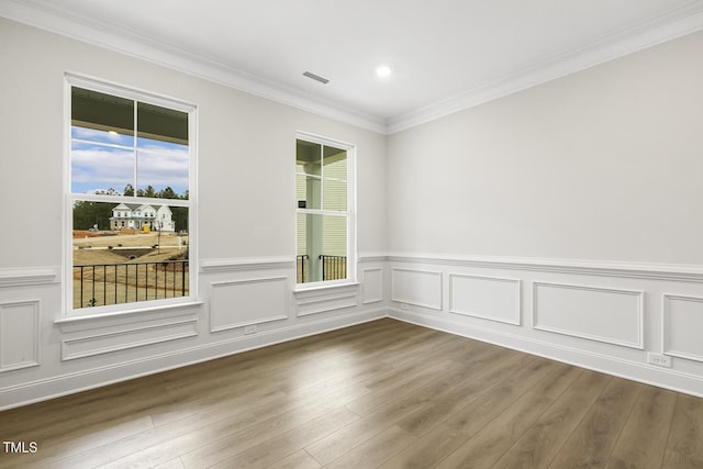 unfurnished room with crown molding and dark hardwood / wood-style floors